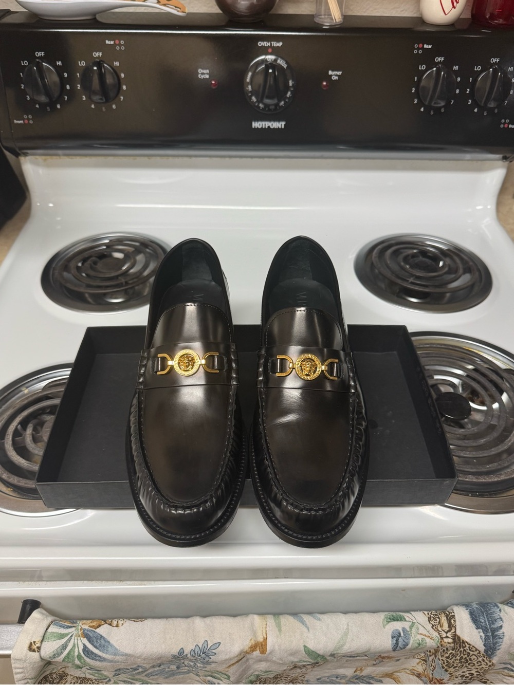 Versace Black Leather Slip-On Loafers with Gold Medallion Detail